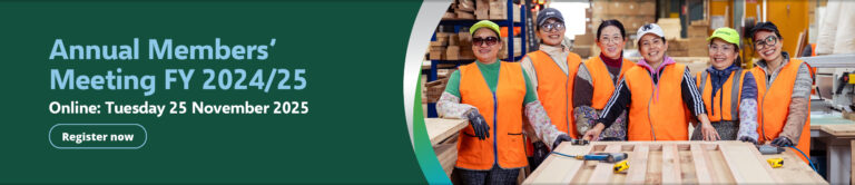 Annual Members Meeting FY 2024 - 2025. Online Tuesday 25 November 2025. Register now. Image of a group of smiling women wearing orange high vis in timber warehouse.