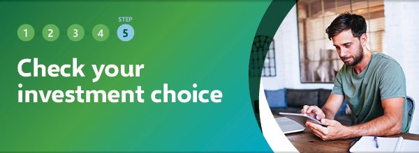 Smiling man making an investment choice online
